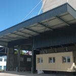 Neubau der Einhausung der Gossenanlieferung von Fenaco.