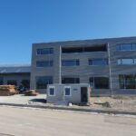 Neubau der Werkhalle und der Bürogebäude.