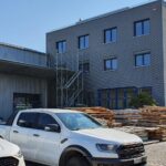 Neubau der Werkhalle und der Bürogebäude.